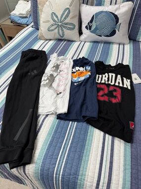 Nike Kids Black and White Athletic Pants and Graphic Tees Set